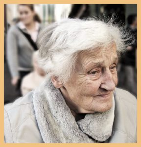 Face of elderly woman signifying the impact of strong hospital vision and strategy