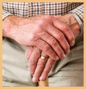 Elderly man with hand on hand signifying better clinical outcomes