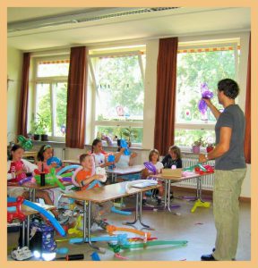 Teacher with children in kindergarten classroom signifying the positive impact of teacher leaders