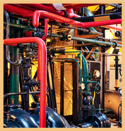 Intricate web of piping signifying the impact of smooth execution on operations performance