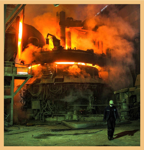 Red molten metal in blast furnace signifying the impact of self-adjusting execution on operations performance