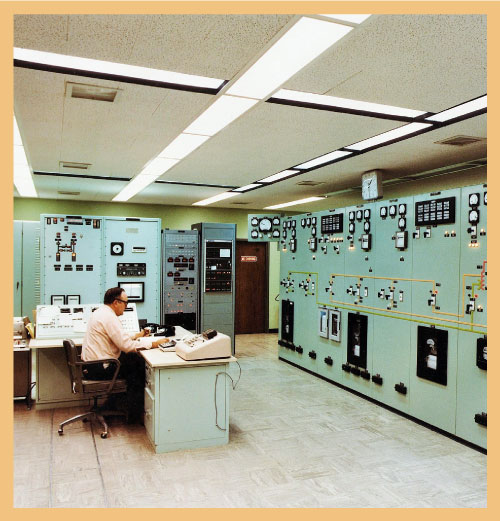 Person in control room of factory signifying high quality operations people transforming performance